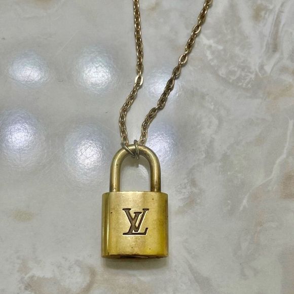 gold lv lock necklace